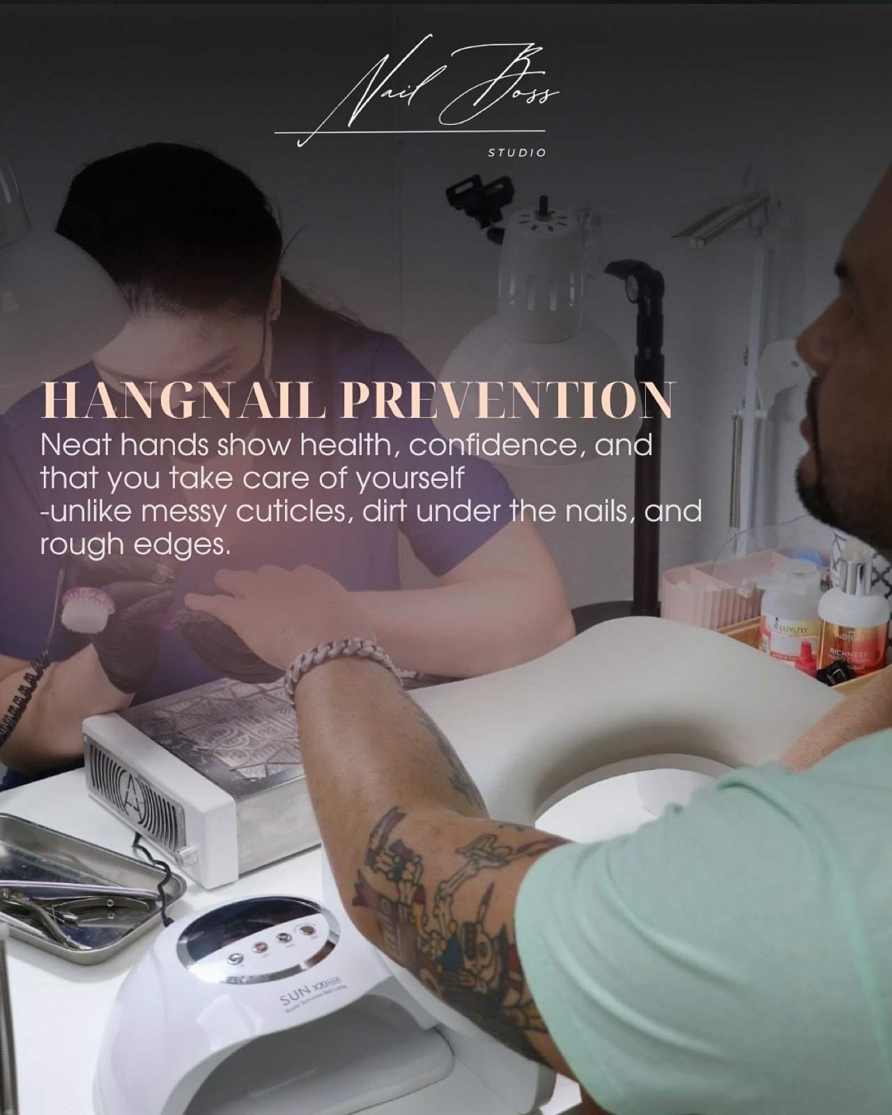 Nail design inspiration for russian manicure Tampa: Nail technician performing hangnail prevention on client's hands in studio with UV lamp and products visible